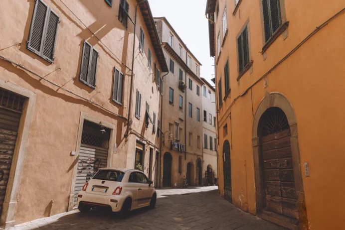 Italian road with a car 
